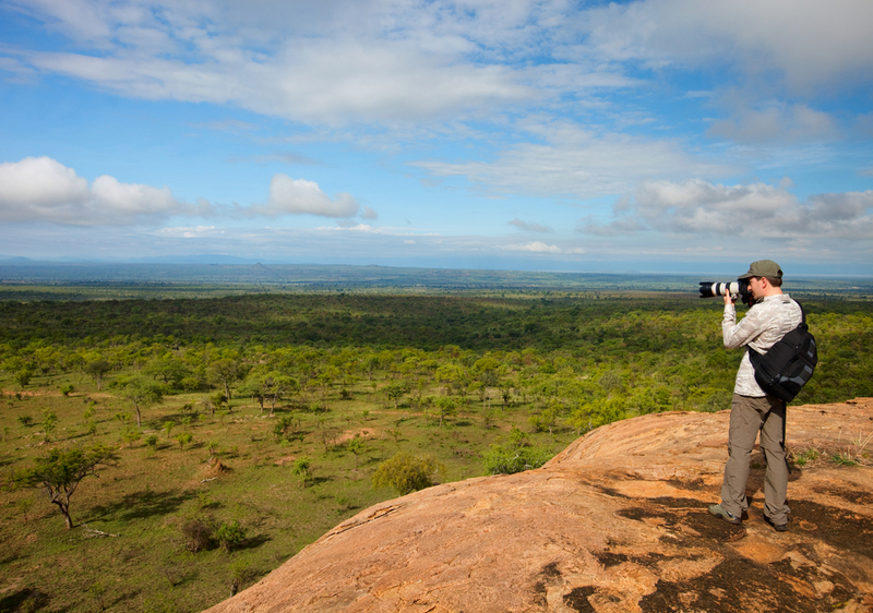 Solo traveller taking a photgraph of the scenery