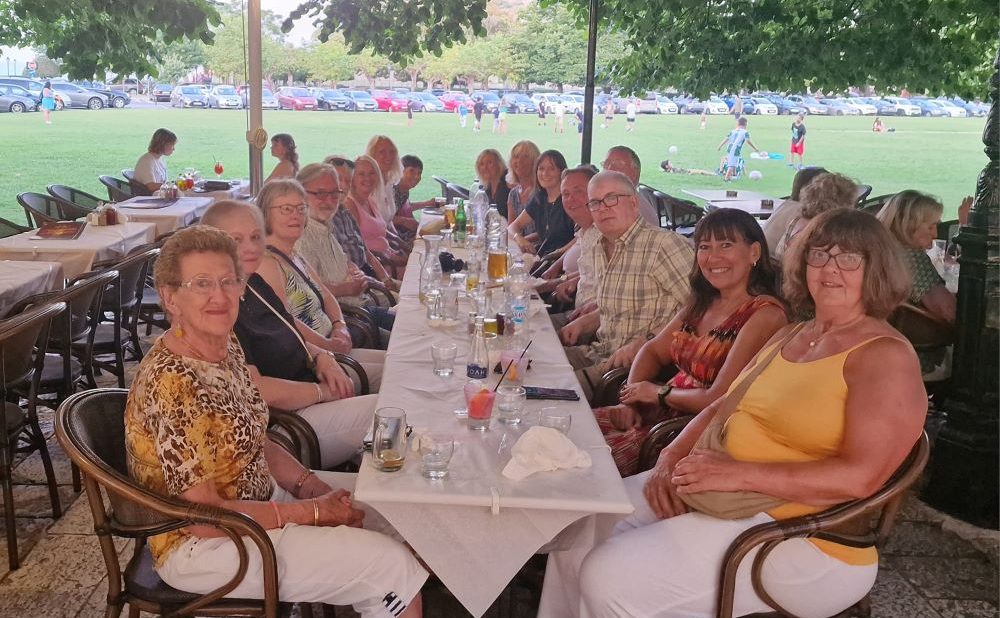 A group of people dining in Corfu, Greece