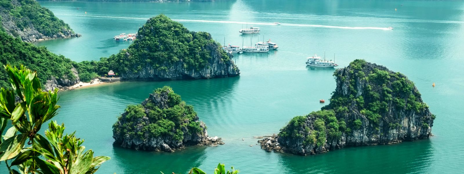 Boats cruising in ocean Ha Long Bay, Vietnam