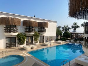 Swimming pool and benches in the Beyaz Suite Hotel in Golturkbuku, Turkey