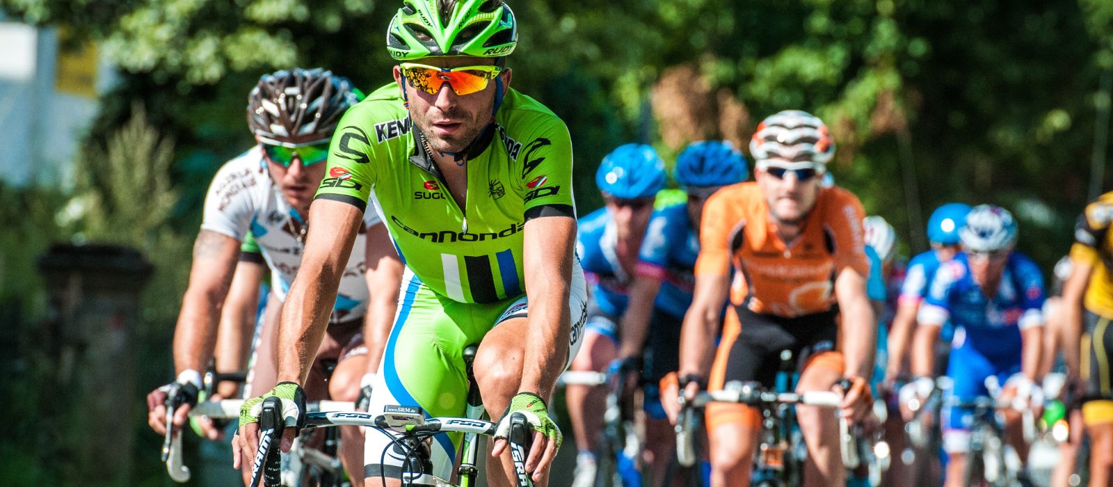 A group of cyclers competing in the Tour de France tournament.